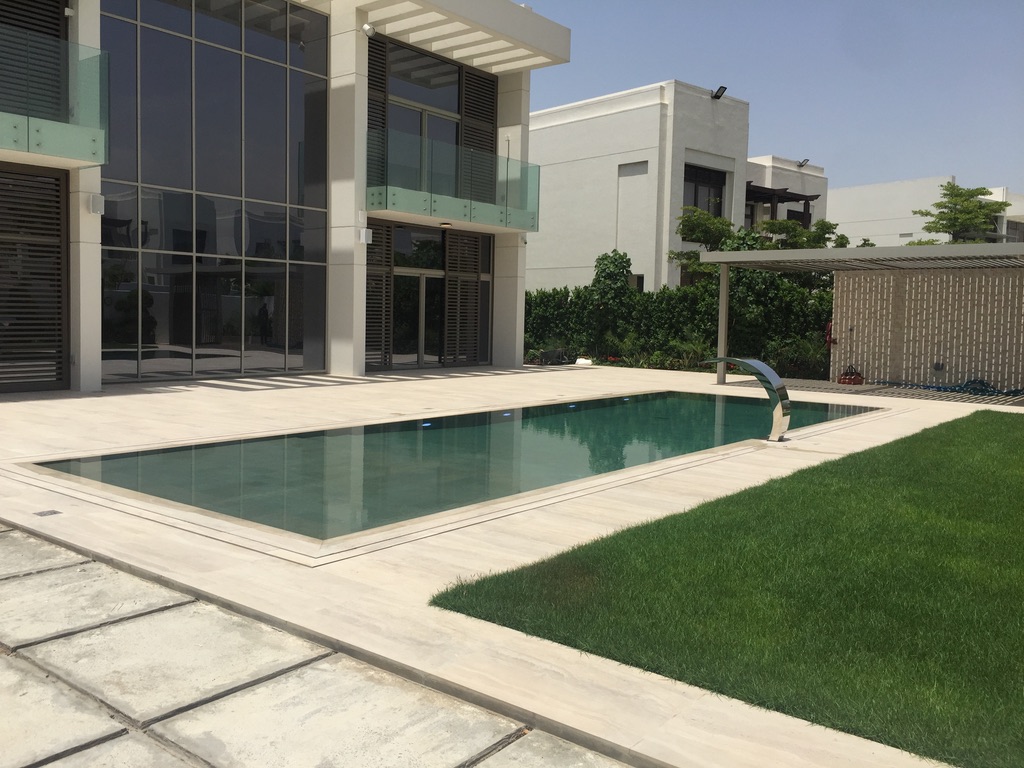 Luxury Overflow Mirror Pool with Bali Tiles | District One Dubai