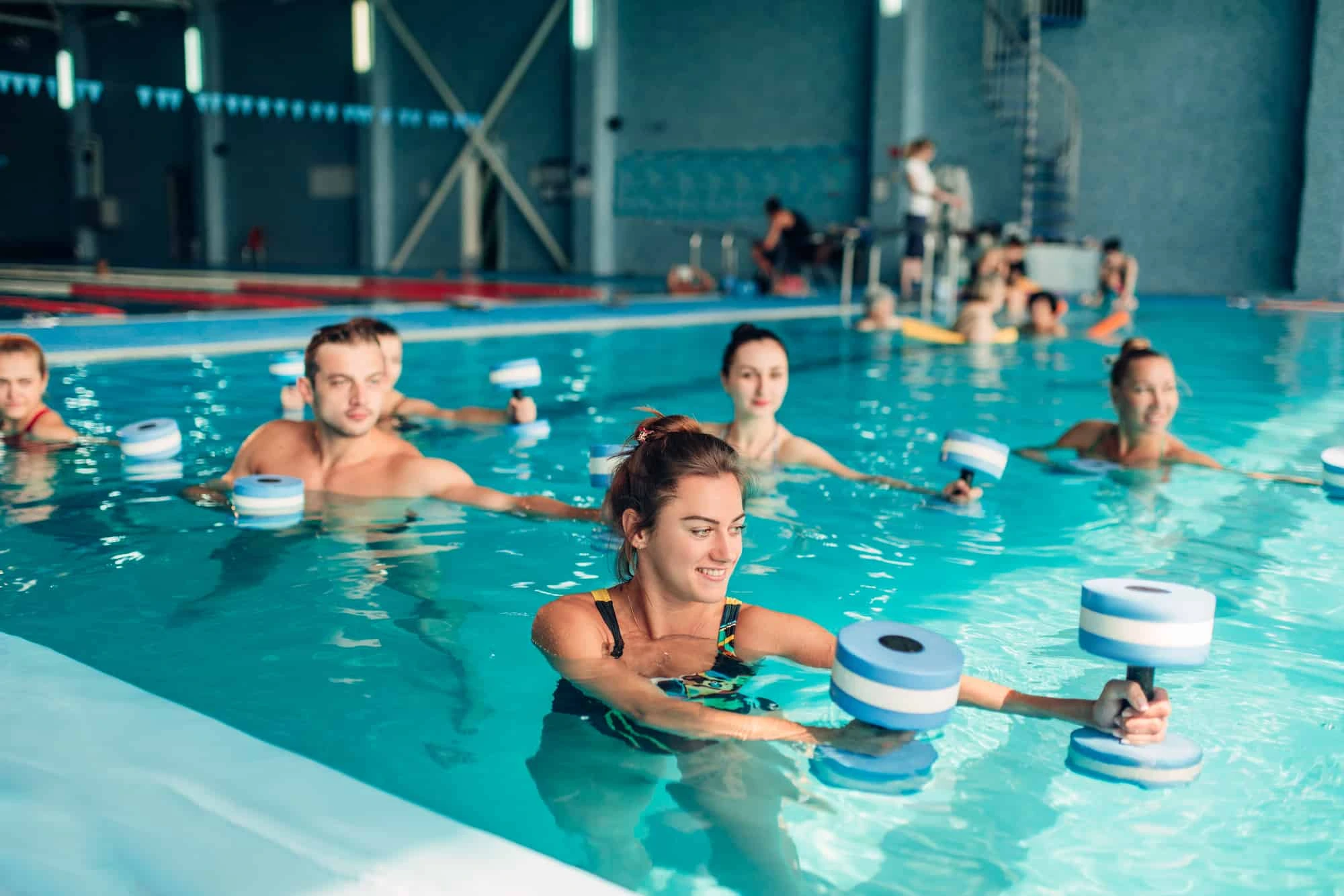 Modular floating aquatic exercise stations in a pool
