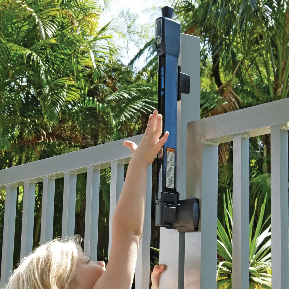 Child safety pool fence around residential swimming pool for safer family living