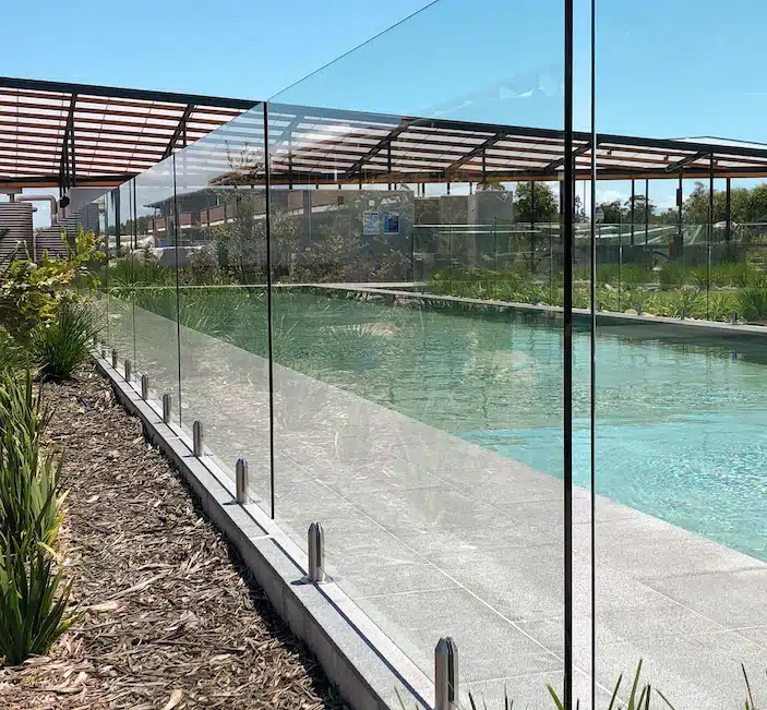 Frameless glass pool fence UAE with clean transparent panels and premium finish